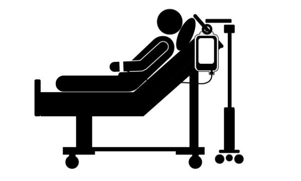 Patient-in-hospital-bed-600x372